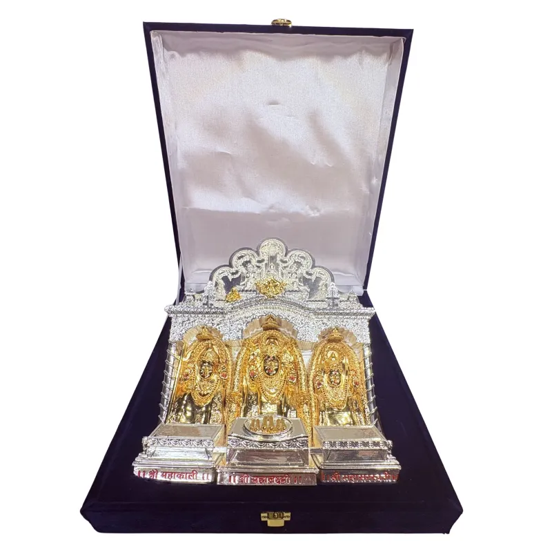 Gold and silver Mahalaxmi shrine inside a velvet presentation box