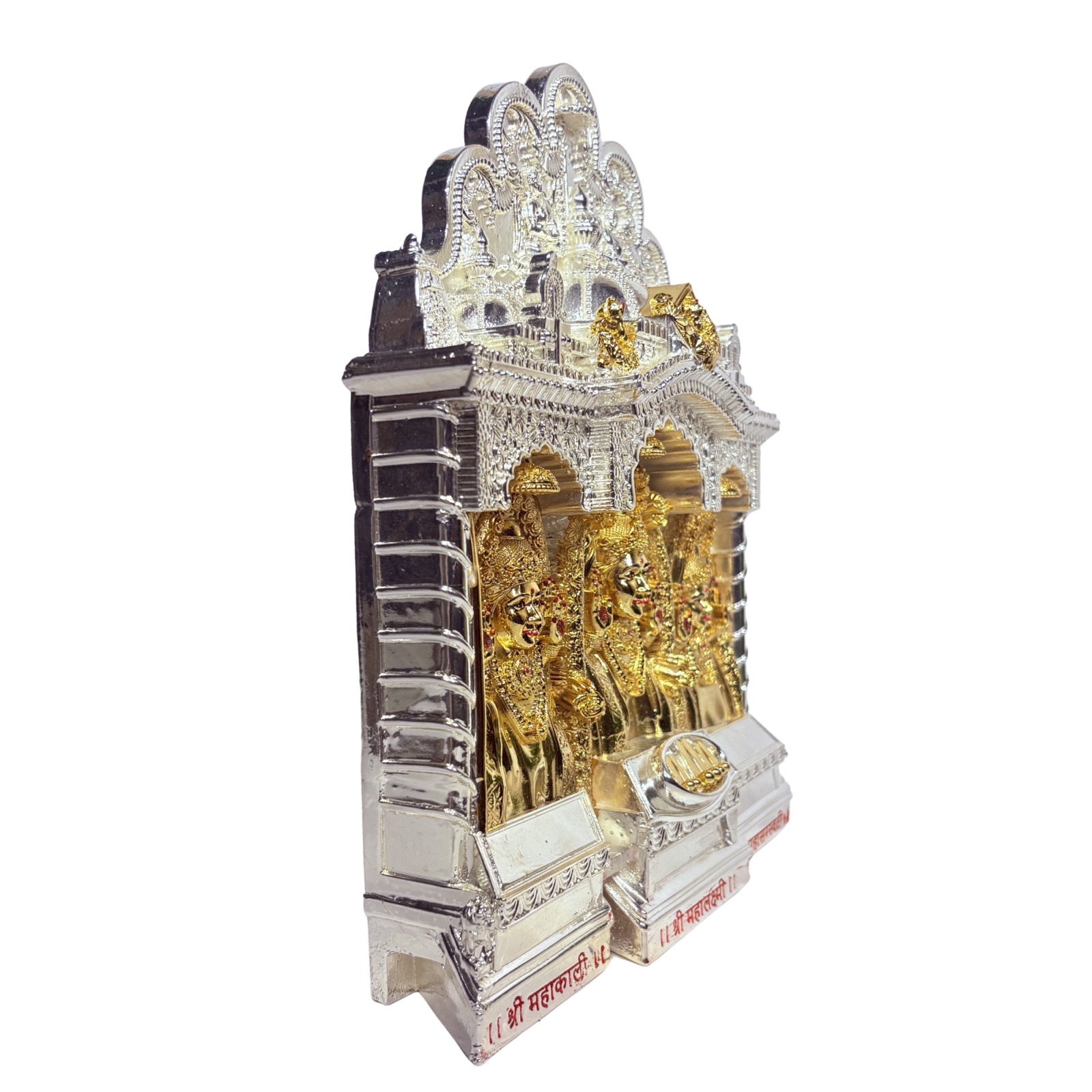 Gold and silver plated Mahalaxmi murti, full view against a plain backdrop